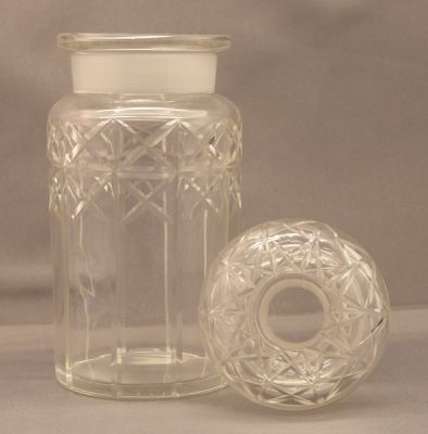 Cut-glass pickle with castor and drip catcher
Cut stopper, polished base to jar
Keywords: sold;cut;british;table