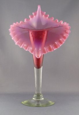 Cranberry and uranium Jack in the Pulpit vase
Opalescent rim. Likely English
Keywords: blown;british;vase