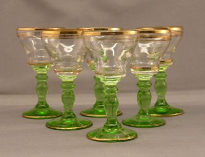 Green and gilded liqueur glass
Shear marks on base
Keywords: blown;czech;enamelgilt;sold