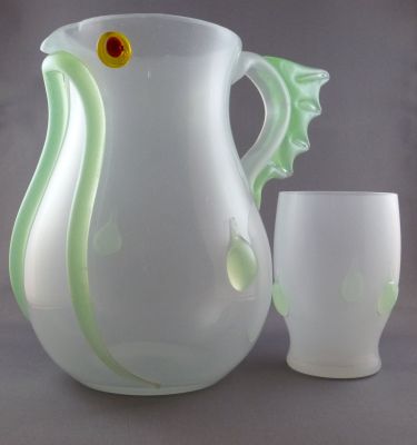 Loetz Teschner jug and tumbler set
Designed by Richard Teschner and is design number 4506 in the Loetz archives. Its design was series II production and appears for the first time in 1908. Marked on jug base Made in Czechoslovakia, so produced post 1918.
Keywords: czech;barware;blown;figure