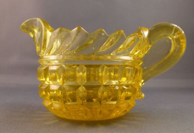 Molineaux Webb creamer/milk jug B
Early model? Single serving. 402 in pressed glass catalogue. Polished pontil mark. Marked Patent. Patented 1863 (thanks Neilh)
Keywords: british;pressed;table