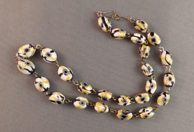 Blue and yellow millefiore necklace
Vintage. Probably Murano. Gold (rolled) wires?
Keywords: murano