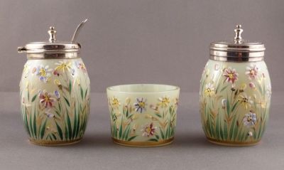 Enamelled uranium opalescent cruet set
Raised enamel flower, flat leaves and gilding. Ground unpolished bases
Keywords: blown;enamelgilt;table