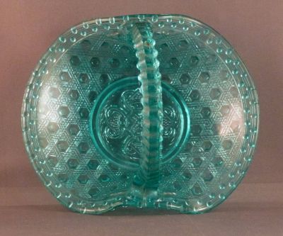 Greener uranium basket A (blue)
Registration lozenge where the handle joins the base. Deposition number 238105, 14 January 1870
Keywords: british;pressed