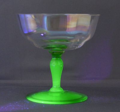 Iridescent, uranium-stem champagne coupe
Under UV
Keywords: barware;blown;sold
