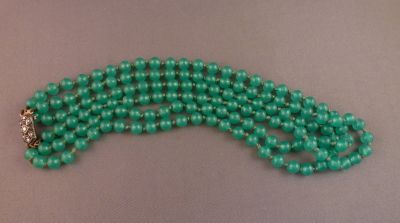 Blue-green uranium necklace
Three string choker style. Marcasite clasp
Keywords: uranium;sold