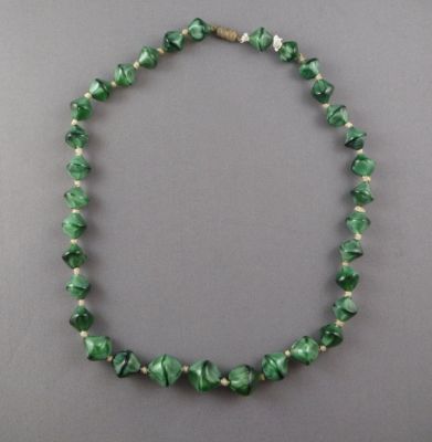Malachite glass
Moulded beads
Keywords: sold