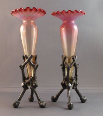 Pink opalescent with uranium stand vase
White metal frames
Keywords: blown;british;vase