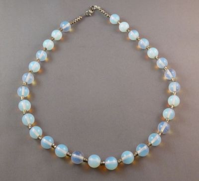 Opalescent necklace
Modern with metal beads
