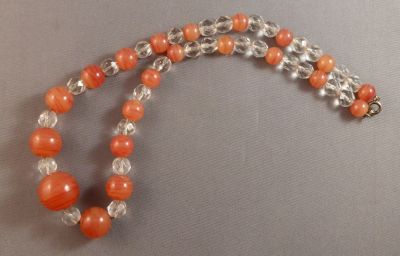 Orange uranium beads with crystal
Marbled
Keywords: uranium