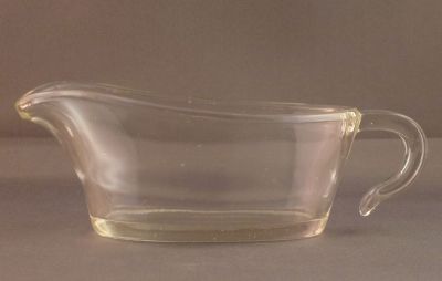 British Heat Resisting Glass Co. sauce boat
Brand name Phoenix. 
Keywords: british;table;kitchenware