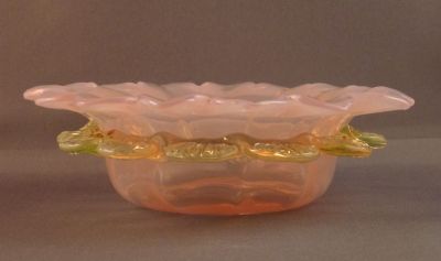 Pink and uranium preserve dish
Opalescent pink with uranium frill and polished pontil mark. English
Keywords: blown;british;table