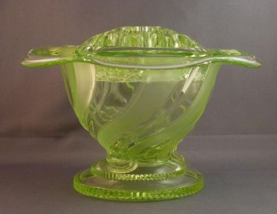 Sowerby T.2624 rose bowl 
Flower holder is the same as the 2570 and the coggy foot appears on the Dora vase
Keywords: british;pressed;vase