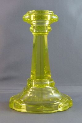 Joseph Webb or Edward Moore (4725) uranium candlestick
Moore bought Webb's moulds. Shown in 1888 Moore supplement to Pottery Gazette 
Keywords: candle;british;pressed