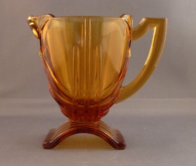 Stölzle creamer/milk jug, amber
No. 18955 Heřmanova huť 
Keywords: pressed;table;sold;czech