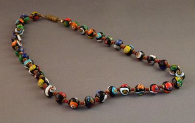 Venetian millefiori beads
Vintage: old catch, brass caps, knotted red string
Keywords: murano