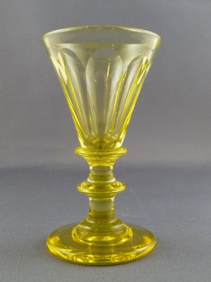 Yellow uranium cut glass cordial
Polished pontil mark. Likely English
Keywords: blown;cut;barware;british